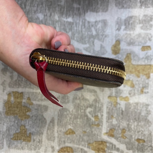 Louis Vuitton Clemence monogram wallet with fuschia interior. - Picture 7 of 8